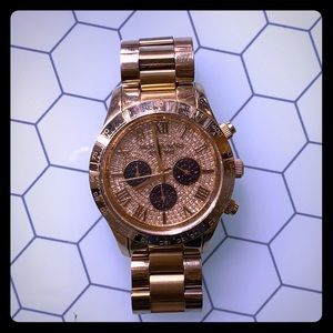 Michael Kors jewel gold watch with black accents